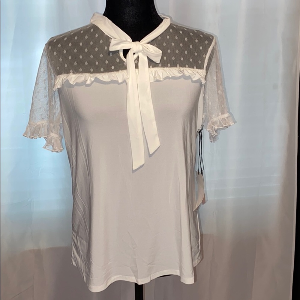 White blouse with bow tie and sheer sleeves
